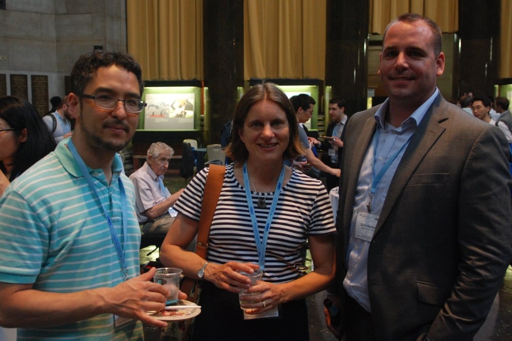 SIOE conference photo: Mark Koyama, Anja Shortland, and David Skarbek in conversation.