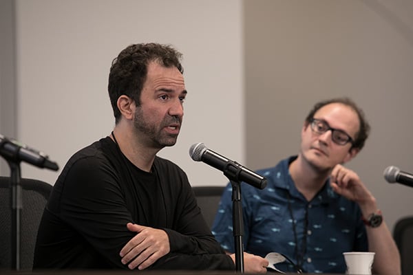SIOE conference photo: Jaan Tallinn and Joel Leibo in discussion.